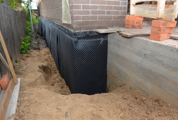 Happy homeowners after waterproofing job in Ransomville